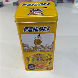 Reiki brand piggy bank shaped like a toy crane machine